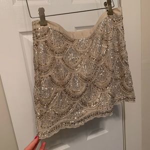 Size 4 high waisted sequenced miniskirt.